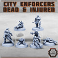 Dead and injured Enforcer gangers for your grimdark future cyberpunk games under the mortalis hive.